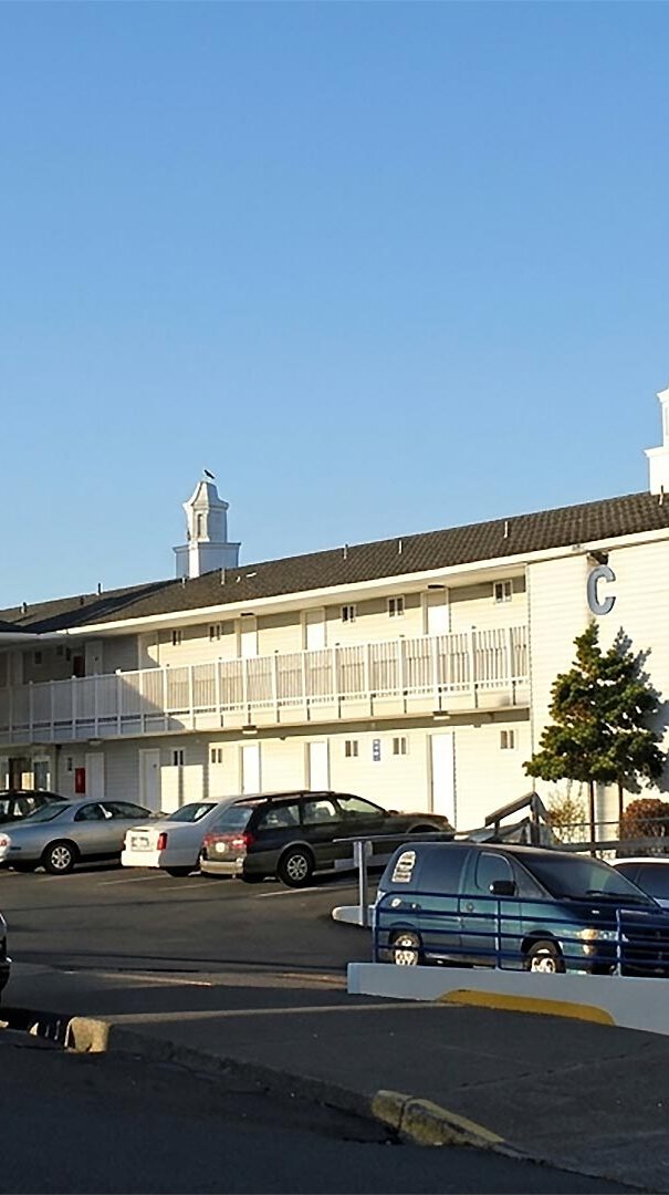 Seagrass Oceanfront Inn exterior and parking lot