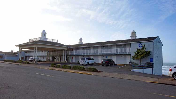 Seagrass Oceanfront Inn exterior and front parking lot